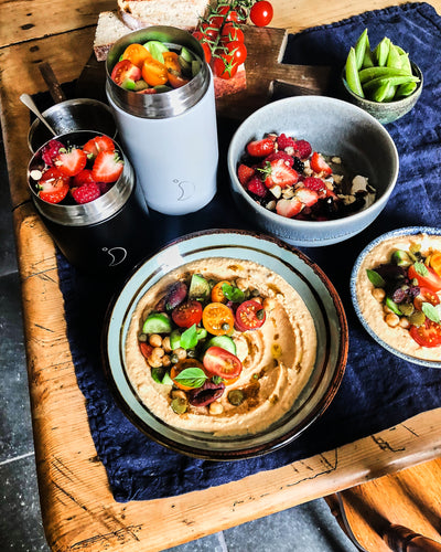 Harissa dip topped with caper salad and za’atar dressing, followed by a summer berry fruit salad